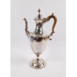 A George III silver coffee pot, by George Smith, the inverted oval body surmounted by a domed lid