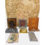 A Hepworths tie press, stained glass heraldic panel, further stained glass panel, tapestry, wall