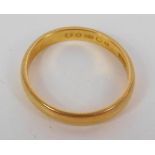 A 22ct gold wedding band, size L, 3.2g.