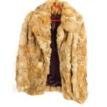 A Korean rabbit fur coat size 16.