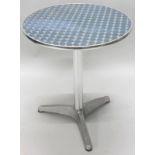 A modern aluminium cafe table, with a circular top, on cylindrical column and triform base, 60cm