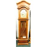 A longcase clock, with simulated mahogany and burr wood style veneer, the arched dial stamped Tempus