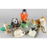 A collection of decorative animal ornaments, to include Goebel birds, Hummel figure, Tom Raymond cat