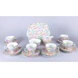 A Shelley Rock Garden pattern part tea service, to include six cups, saucers, cake plate, sugar