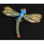 A novelty dragonfly brooch, with enamel design and purple cabochon eyes, white metal stamped 925,