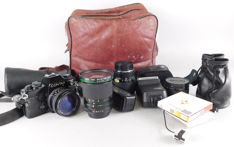 A collection of camera equipment, to include some lenses etc.