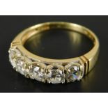A 14K gold ring, set with five diamonds, each approx. 0.06cts, totalling 0.31cts, in a rub over