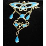 A silver and enamel Norwegian drop brooch, set with blue enamel in the Art Nouveau style, marks to