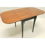 A 1960's walnut and ebonised drop leaf table, registration stamp to underside, 75cm wide