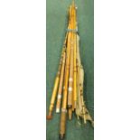 Various split cane and other fishing rods, mostly unmarked