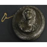 A cameo brooch, with gold plated back and safety chain, depicting lady, 6cm high