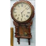 A 19thC mahogany wall clock, with painted dial, the case carved with leaves etc, possibly