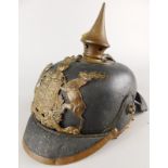 A late 19th-early 20thC German Pickelhaube helmet, with armorial badge, etc. (AF)