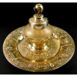 A Victorian Scottish silver circular inkstand, the lid mounted with an orb, supported by leaves,