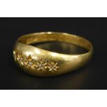 An 18ct gold gypsy ring, set with five tiny illusion set diamonds, in a fitted box, 2.1g all in