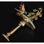 A Coro-Craft bird fountain brooch, set with red, green and white paste stones, gold plated on