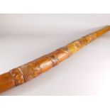 Tribal Art. A late 20thC carved African horn, 132cm long