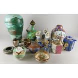 A quantity of oriental pieces, to include a bullet shaped vase with green and turquoise glaze, a