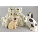 A collection of 19thC and later Staffordshire Spaniels etc.