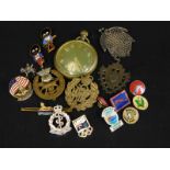 Various military related items etc., to include a silver plated pocket watch, cap badges etc.