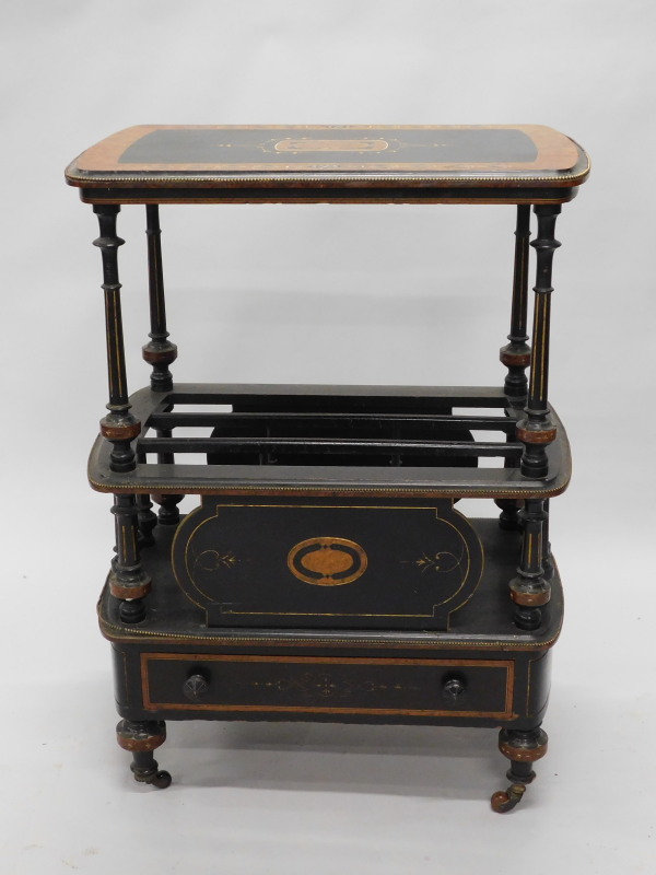 A late Victorian ebonised and amboyna Canterbury whatnot, the rectangular top with moulded edge,