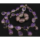 Two items of stone set jewellery, to include a silver and purple stone drop graduated necklace,