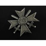 A German white metal Iron Cross, bearing the date 1939 and stamped 800 verso.