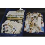 A large quantity of tea and other trade cards, stamps etc.