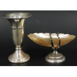 A silver trumpet shaped vase, and a salt mounted with a shell (2)