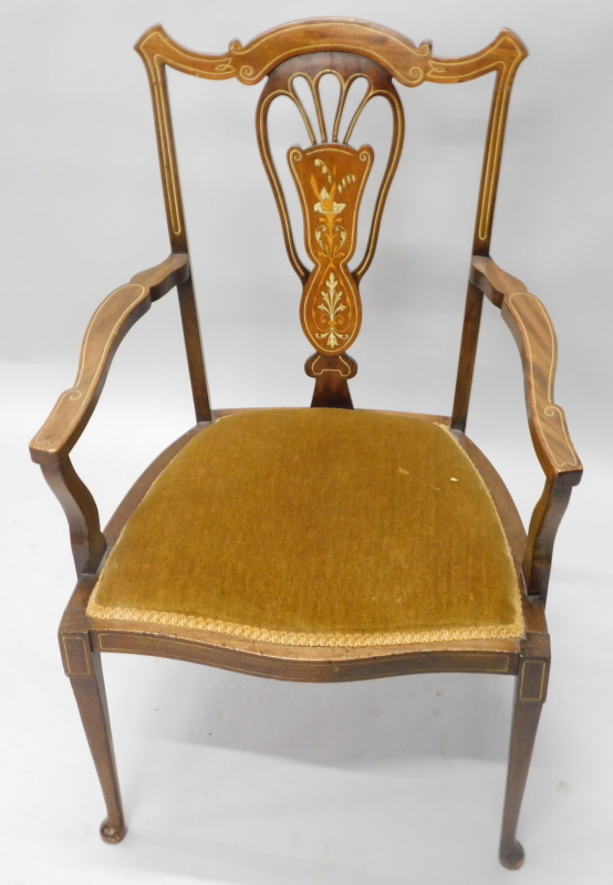 An Edwardian mahogany and marquetry open armchair, with a pierced splat, padded seat, on square