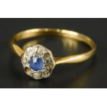 A Victorian 18ct gold sapphire and diamond floral cluster ring, with central pale blue sapphire,