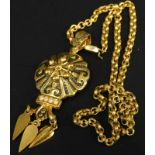 A modern gold plated pendant and chain, the pendant of Eastern style, with floral centre and three