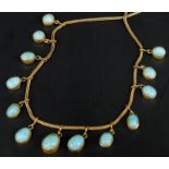 A Victorian gilt metal and turquoise necklace, with graduated drop turquoise, gilt metal, 9.6g all