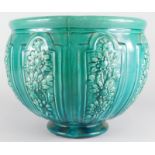A late Victorian turquoise glazed jardiniere, decorated with flower bands etc., impressed mark to