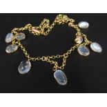 A Victorian moonstone graduated necklace, yellow metal unmarked, 8.8g all in, 36cm long
