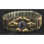 A Victorian gilt metal bracelet, on expanding watch type bracelet, with floral engraving and a