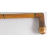 An early 20thC walking stick/pipe, with hidden pipe components etc., 87cm long