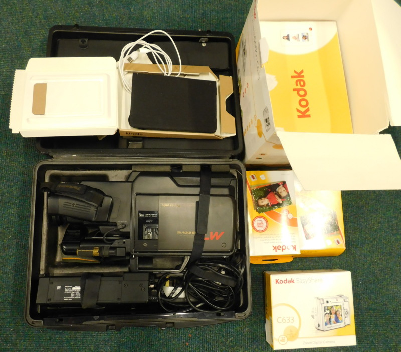 A Panasonic M7 VHS movie camera with accessories, in a fitted case, and other similar items to