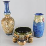 A collection of Royal Doulton and Doulton Lambeth stoneware, to include a blue vase decorated with