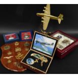 Miscellaneous RAF related items, to include a desk ornament cast with a brass aeroplane, various