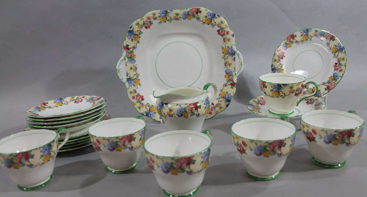 A mid 20thC Aynsley part tea service, comprising sandwich plate, 25cm wide, milk jug, cups,