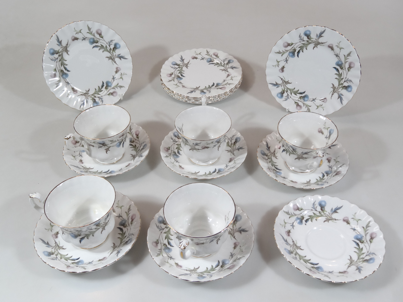 A Royal Albert Brigadoon pattern part service, to include cups, side plates, 16cm wide, and