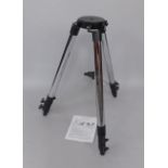 A Meade 884 deluxe field tripod, telescopic use, with instructions.