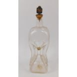 A late 19thC cut hour glass decanter, with a plate topped cork 'Whisky' stopper cast as a lion