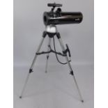 A Sky Watcher refractor telescope, D=114mm, F=500mm, with eye pieces, tripod and synscan remote