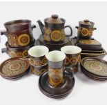 A group of Denby pottery dinner and tea wares, decorated in the Arabesque pattern, comprising