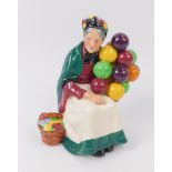 A Royal Doulton figure modelled as The Old Balloon Seller, HN1315.