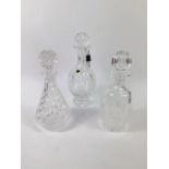 A Waterford cut glass decanter and stopper, decorated in the Seahorse pattern, and two further cut