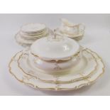 A Royal Doulton porcelain part dinner service decorated in the Monteigne pattern, comprising pair of