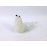 A Murano white glass figure of a seal, with black glass snout and eyes, 27cm long.